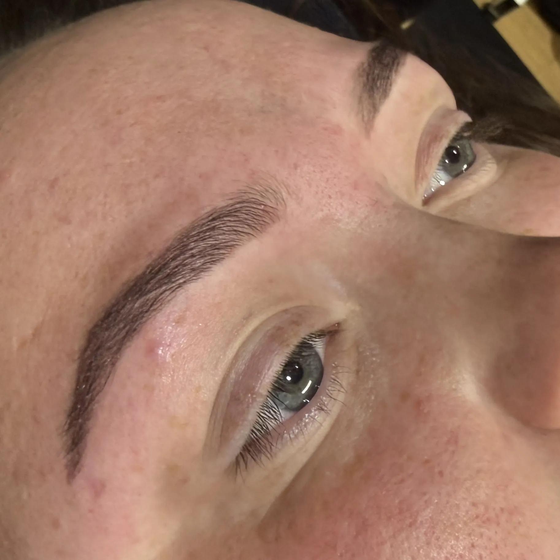 A freshly waxed and shaped brow