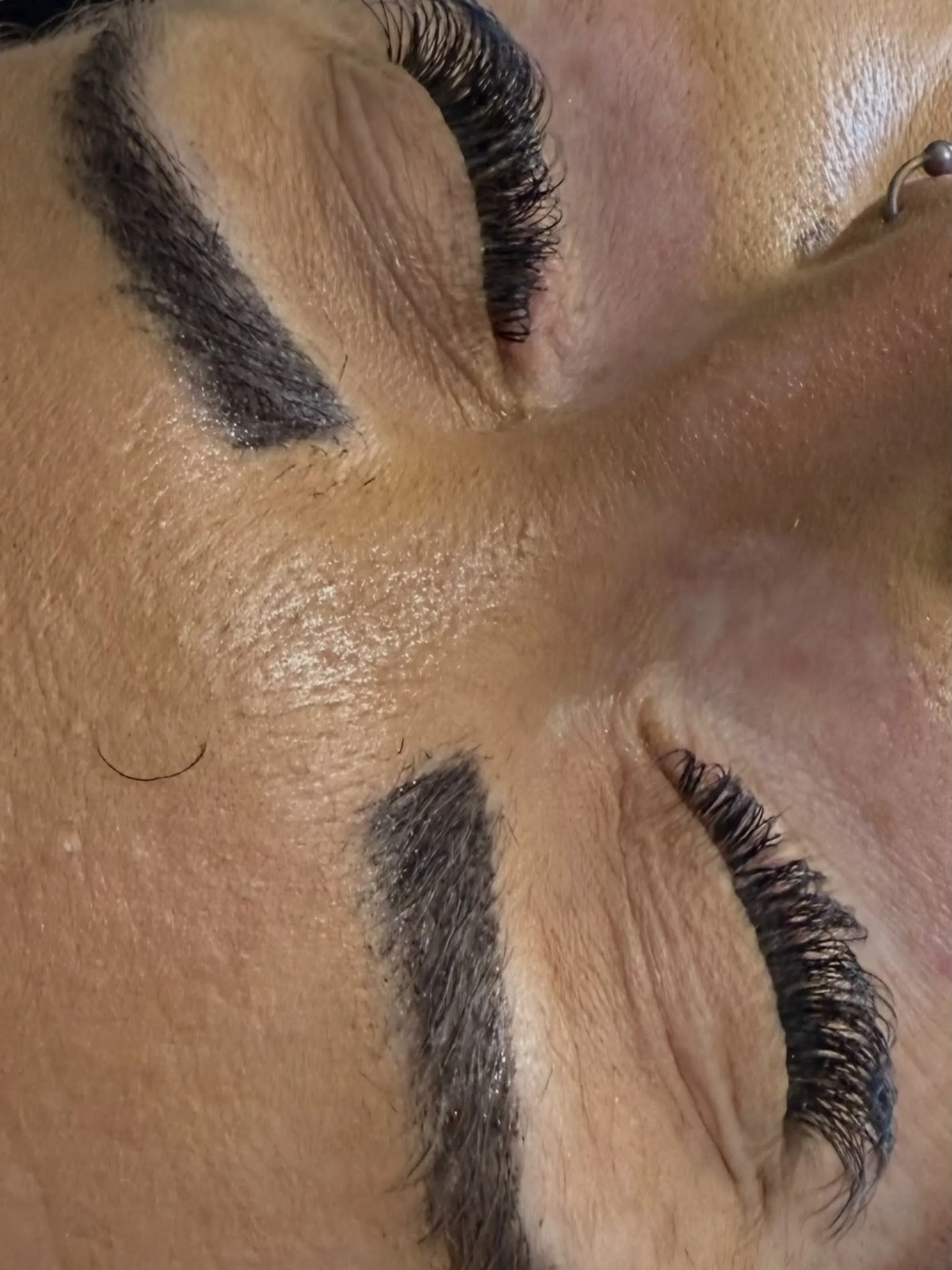 Hybrid brow tint being applied after mapping