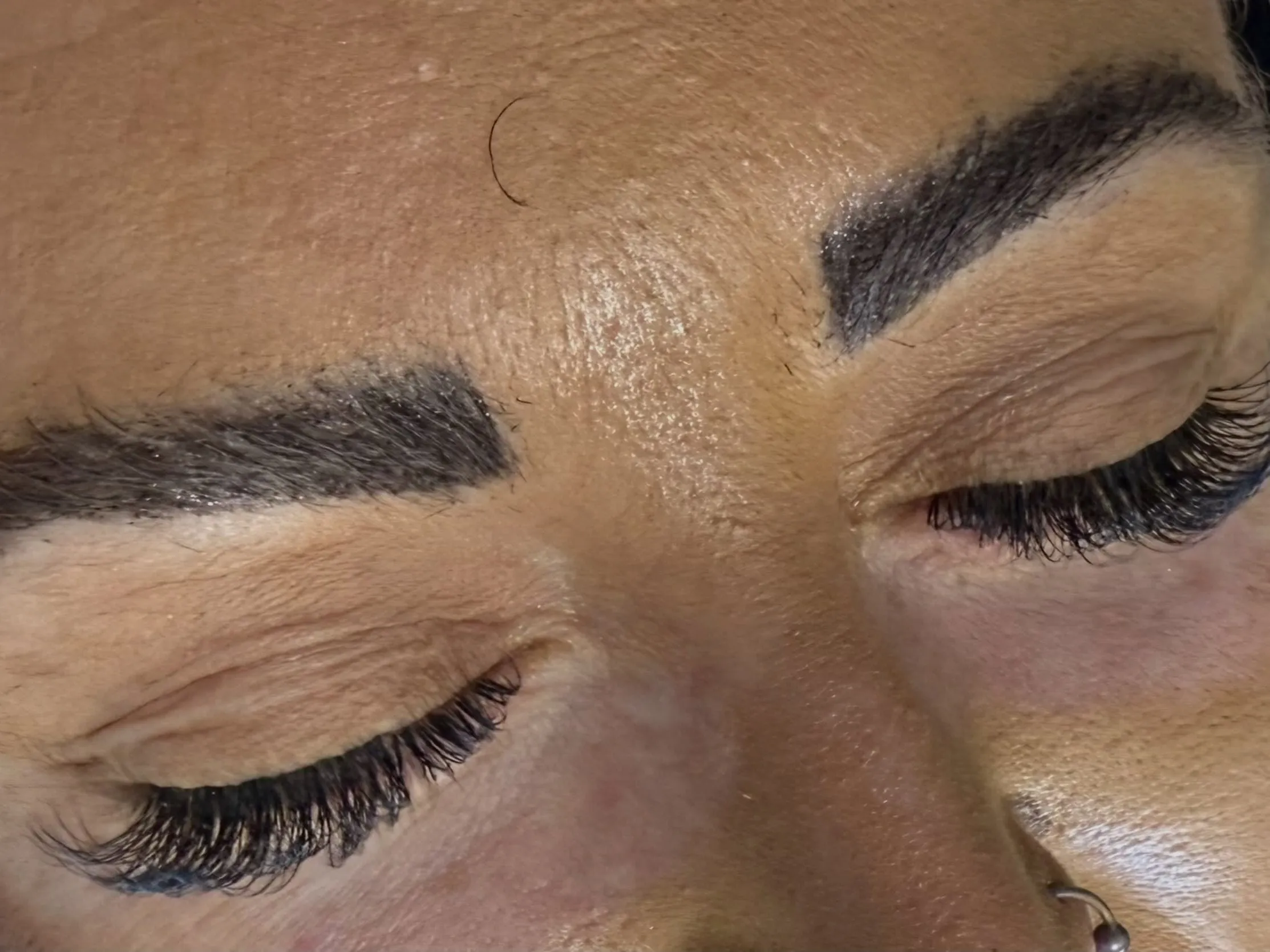 Hybrid brow tint applied to both brows