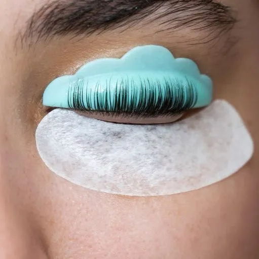 Natural lashes set on a silicone shield during a lash lift
