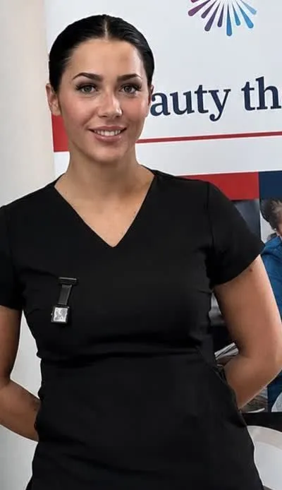 Laura in her black therapist tunic